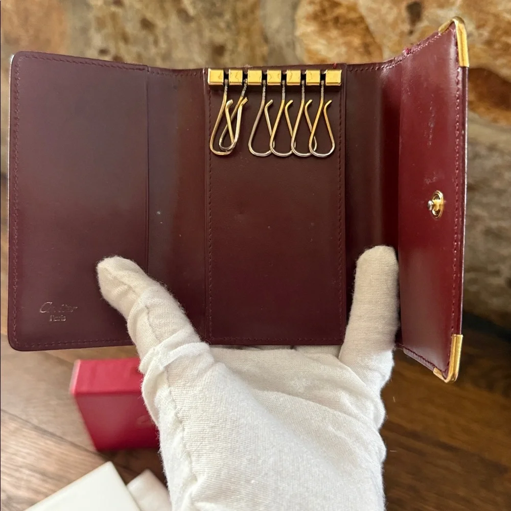Cartier Burgundy Leather Key Card Holder with Gold plated corners w/ box